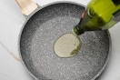 a carote frying pan with olive oil