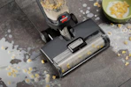 a bissell crosswave cleaning up cereal