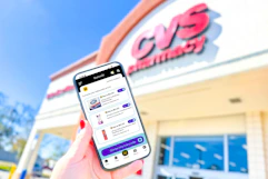 Smartphone displaying KCL Coupons