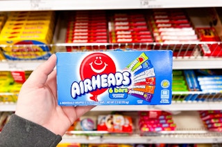 hand holding a box of airheads theater box candy at target