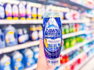 hand holding a bottle of dawn-dish-soap in walmart aisle