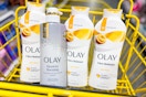 olay body washes in a yellow shopping cart