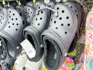 academy crocs fleece lined hanging on rack