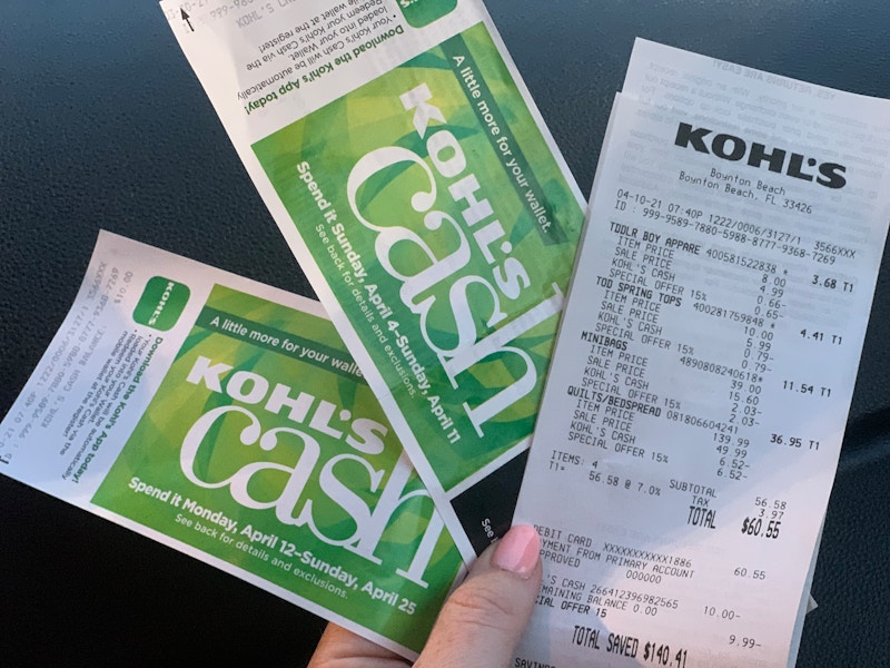 hand holding kohls cash and receipt