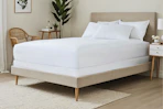 Lifestyle image of a Linens & Hutch padded mattress protector 
