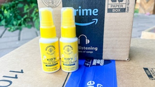 Beekeeper's Naturals Throat Spray next to an amazon prime box