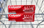 colgate optic white stain fighter toothpaste in a walgreens cart