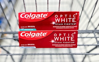 two Colgate toothpaste inside shopping cart