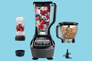 A Ninja Mega Kitchen System blender and food processor, which includes a pitcher, bowl, and travel cup.