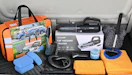 a care cleaning kit in a trunk