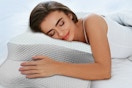 a woman using a cervical pillow
