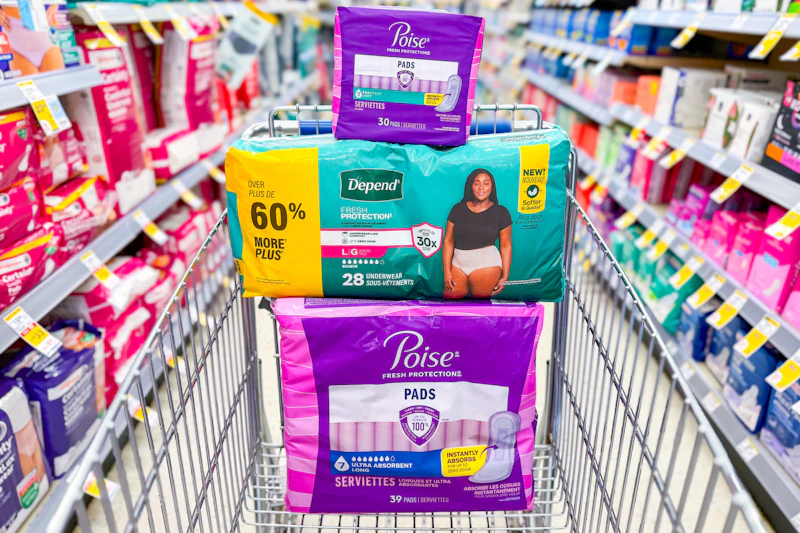 walgreens poise and depend products stacked in a shopping cart
