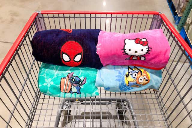 Bluey, Spider-Man, Stitch, or Hello Kitty Beach Towel, $12 Each at Costco card image
