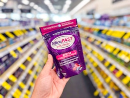 hand holding mirafast chews in cvs
