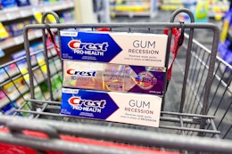 3 tubes of crest premium toothpaste in a cart