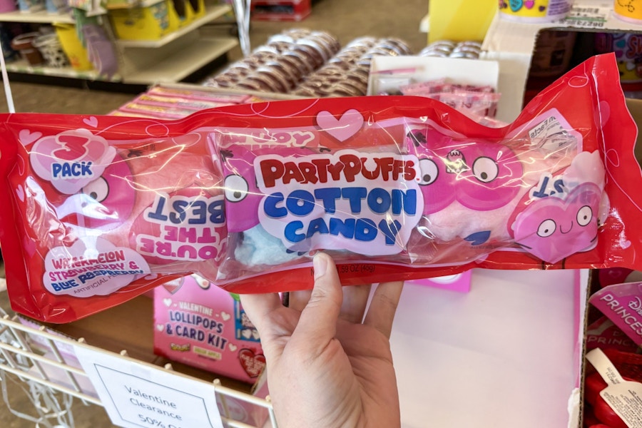 hand holding party puffs cotton candy clearance