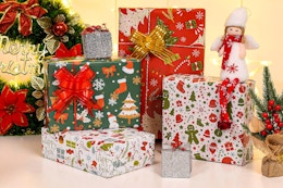 Packages wrapped with PlandRichW Christmas Wrapping Paper.