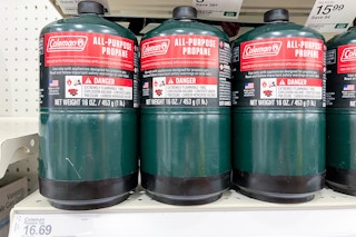Coleman All-Purpose Propane Gas Cylinders sitting on a target shelf