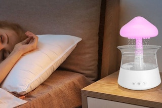 a humidifier next to a bed