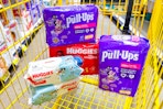 pull ups and huggies products in a yellow shopping cart