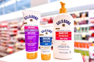 three different gold bond lotion products in a store