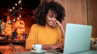 Woman looking at her laptop