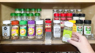 spice rack organized in a cabinet