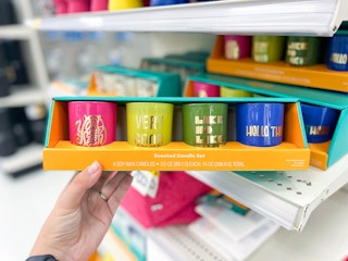 hand holding set of candles