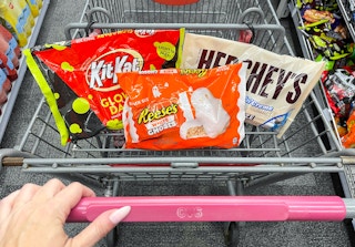 three bags of candy inside cart