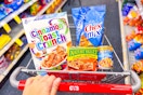 cinnamon toast crunch, progresso, nature valley, and progresso in a cvs shopping cart