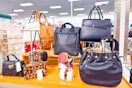 display of a variety of styles of handbags