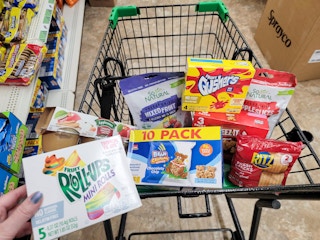 cart containing a bunch of snacks and lunch box packing food