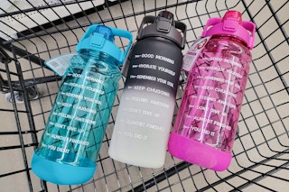 motivational water bottles in a cart