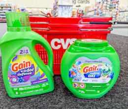 gain detergent products in front of cvs shopping basket