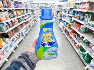 hand holding snuggle fabric softener walgreens