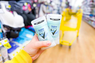 hand holding two degree deodorants