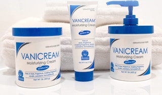 three vanicream moisturizer items in front of towels on a white surface