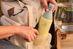 a stanley bottle in a bag