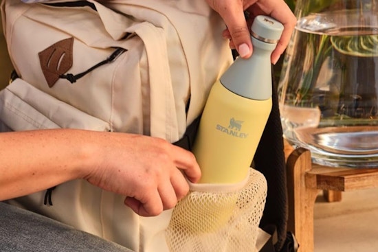a stanley bottle in a bag