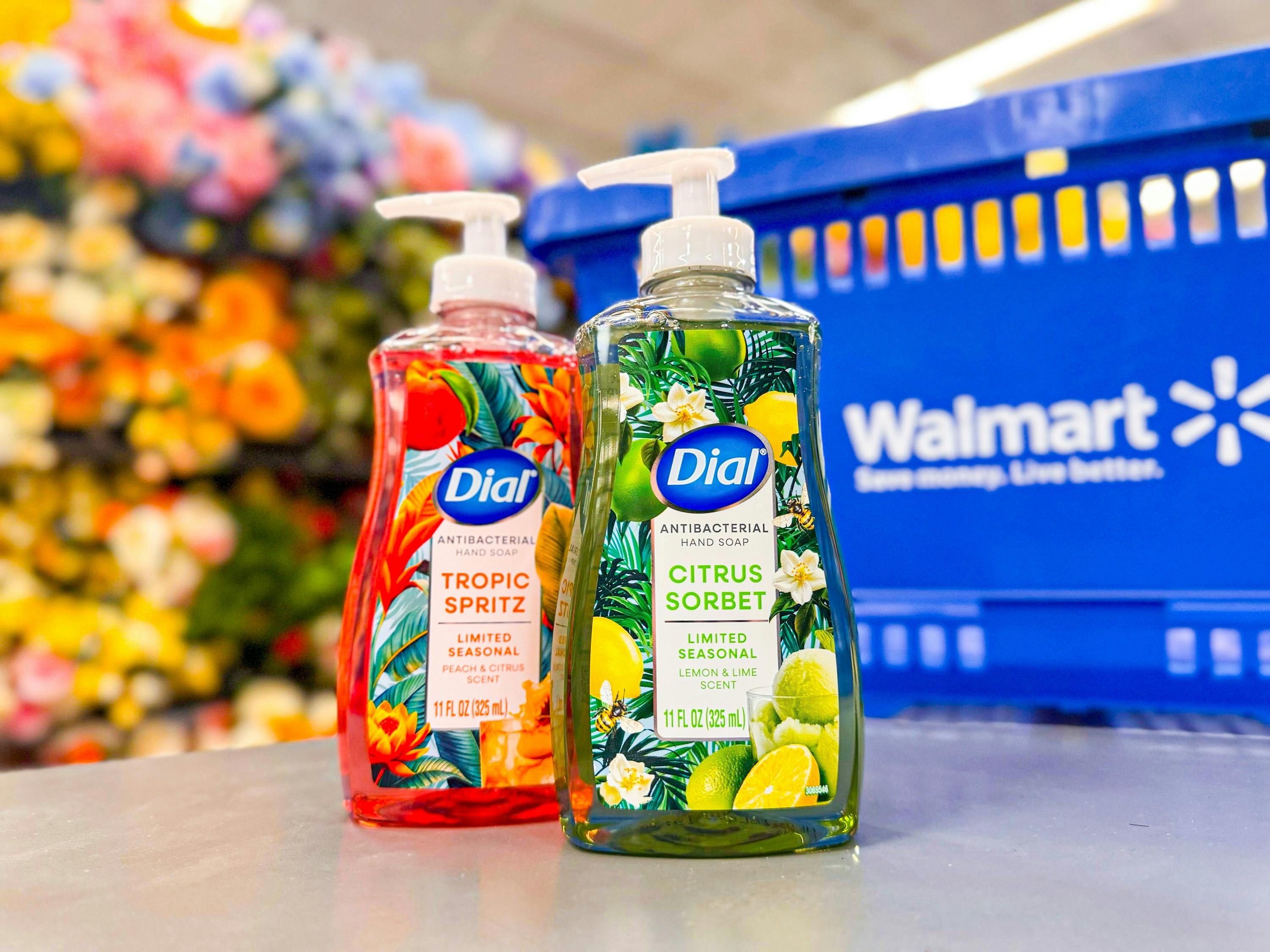 2 Walmart Dial handsoaps in the floral section next to Walmart shopping basket