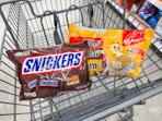 snickers and m&m's chocolate candy bags in walgreens cart