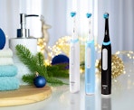 three electric toothbrushes