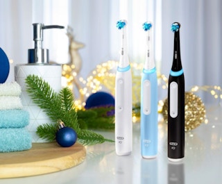 three electric toothbrushes