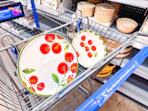 Better Homes & Gardens Tomato Dinnerware in Walmart store