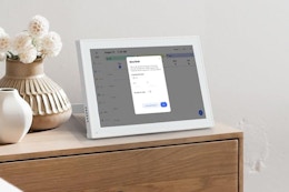 digital calendar on bedside table