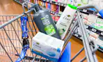 3 Dove products in Walmart shopping cart in store