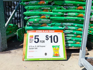 miracle gro on home depot shelf with signage
