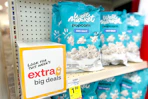 bags of sea salt flavored popcorn on a shelf