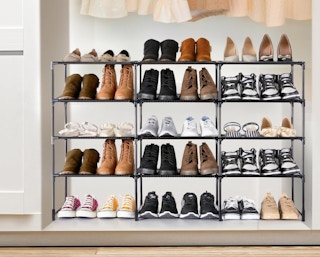 a shoe rack full of shoes in a room