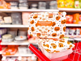 2 cook with color food container sets sitting on top a target cart